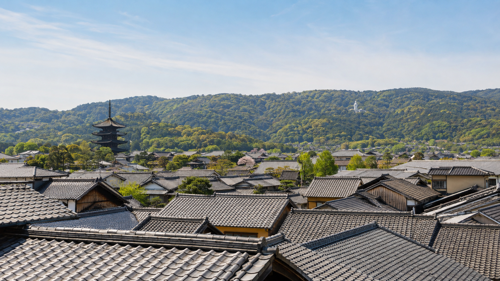 Traditional Kyoto street at dusk with machiya townhouses